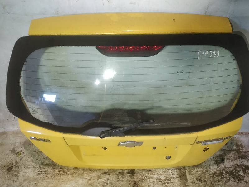 GELTONAS Chevrolet Aveo 2009 Aizmugurējais vāks (pārsegs) - AIZMUGURE