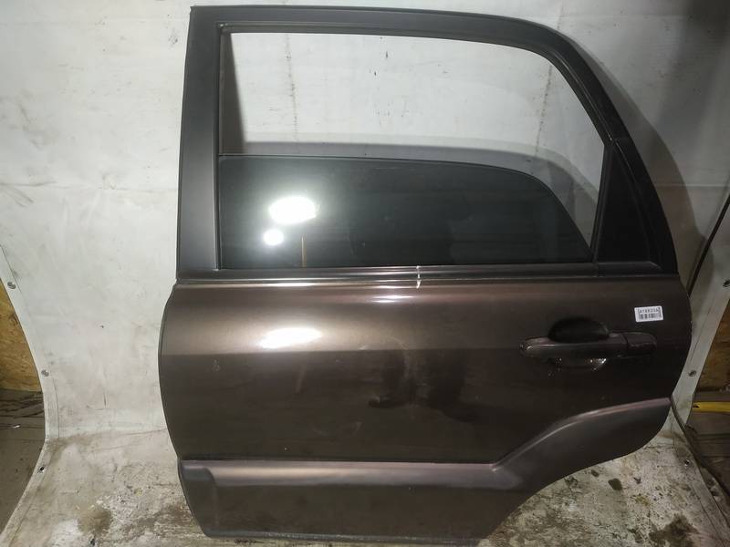 RUDOS Kia Sportage 2006 Durvis - AIZMUGURE PA KREISI