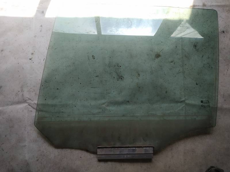 AS2 Opel Zafira 2006 Durvju stikls - AIZMUGURE PA KREISI