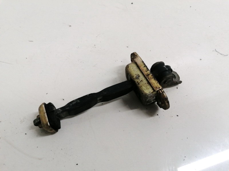 Nissan Almera Tino 2000 Ogranicznik drzwi - PRZEDNIE LEWE