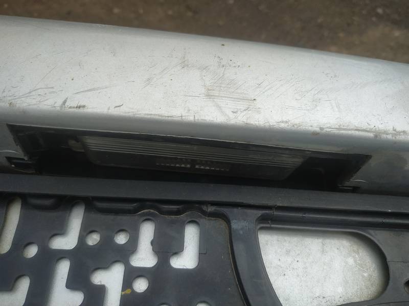 Toyota Yaris 2000 Фонарь подсветки номера