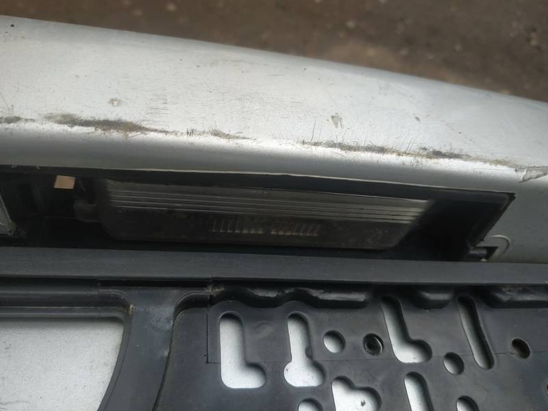 Toyota Yaris 2000 Фонарь подсветки номера