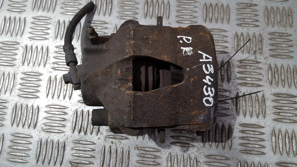 Volkswagen Golf 2004 Zacisk hamulcowy - PRZEDNIE LEWE