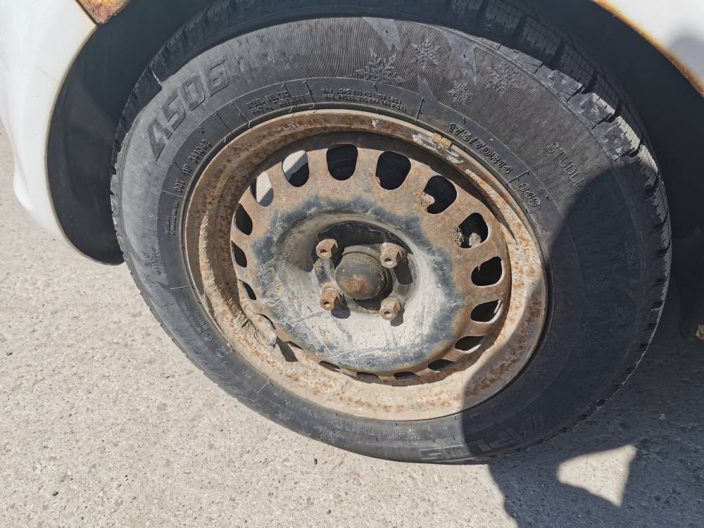 4X100 Opel Corsa 2009 Tin-Ring-Set R14