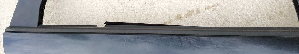 Renault Laguna 2002 Durvju stikla sloksne - AIZMUGURE PA LABI