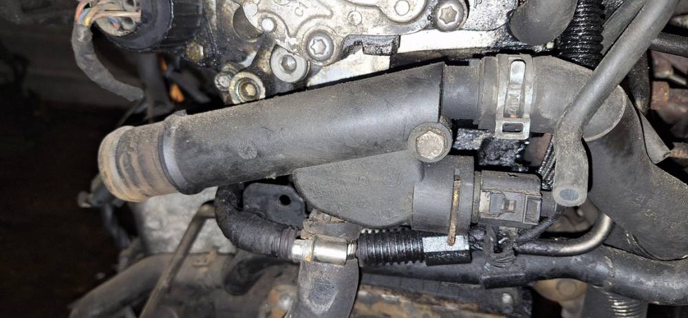 038121132D Skoda Superb 2009 Thermostat Housing (Flange)