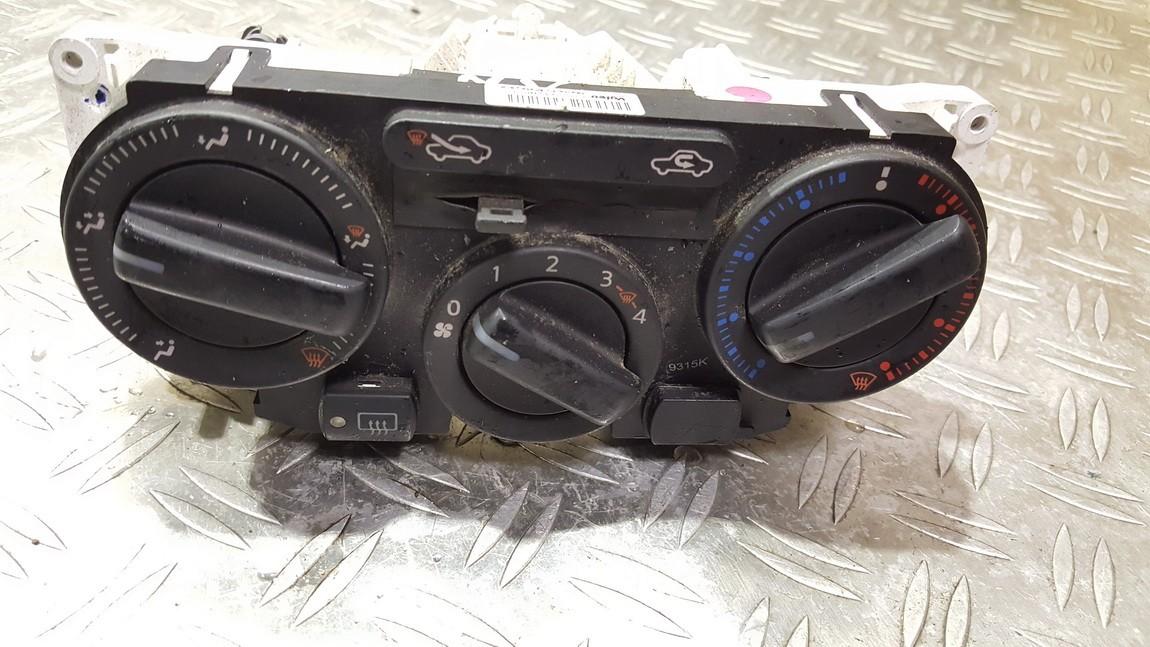 T1009328K Nissan NV200 2009 Climate Control Panel (heater control switches)