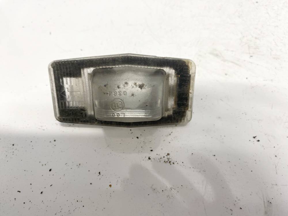 E110384 Mazda 6 2004 Oświetlenie tablicy rejestracyjnej - TYLNE
