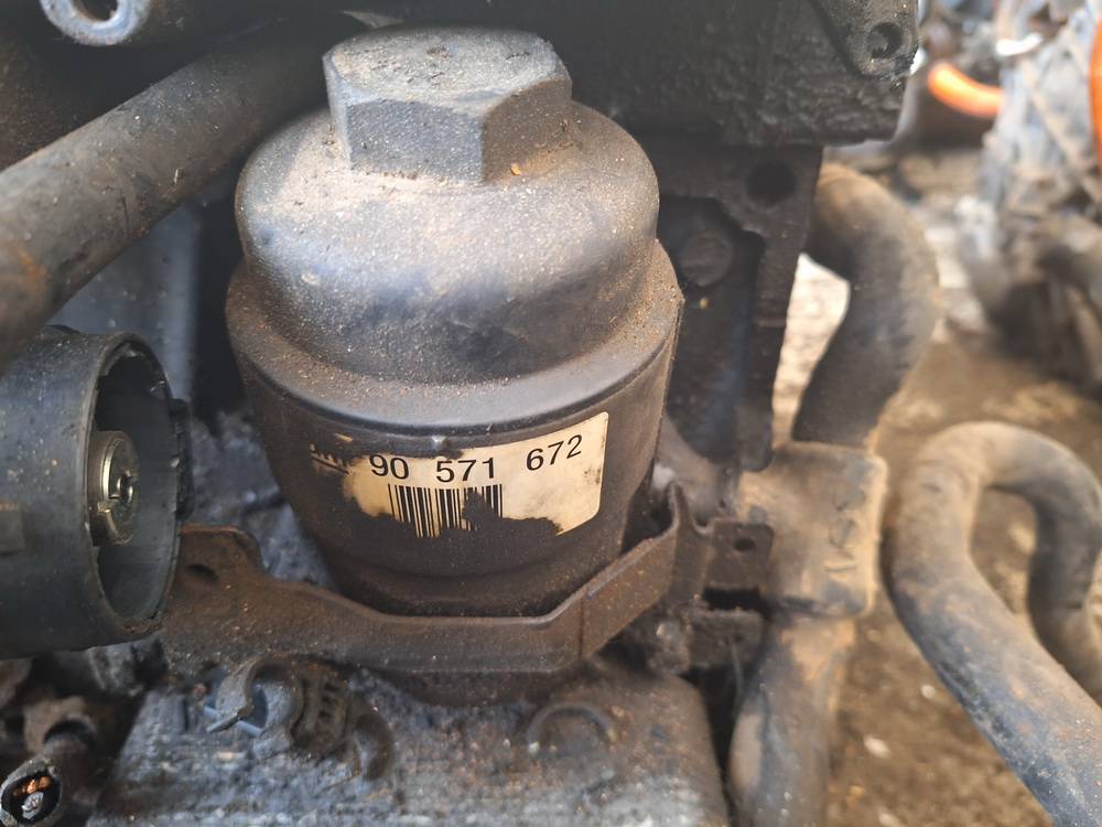 90571672 Opel Astra 2003 Oil Filter Housing (oil filter cooler)