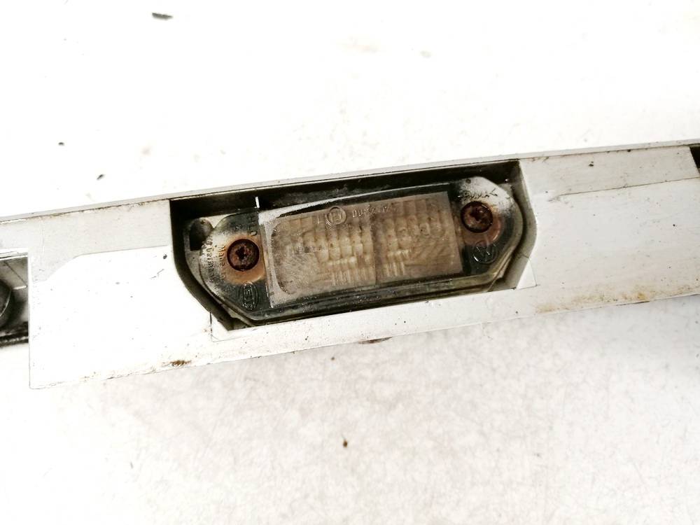 E10022914 Skoda Octavia 2003 Oświetlenie tablicy rejestracyjnej - TYLNE