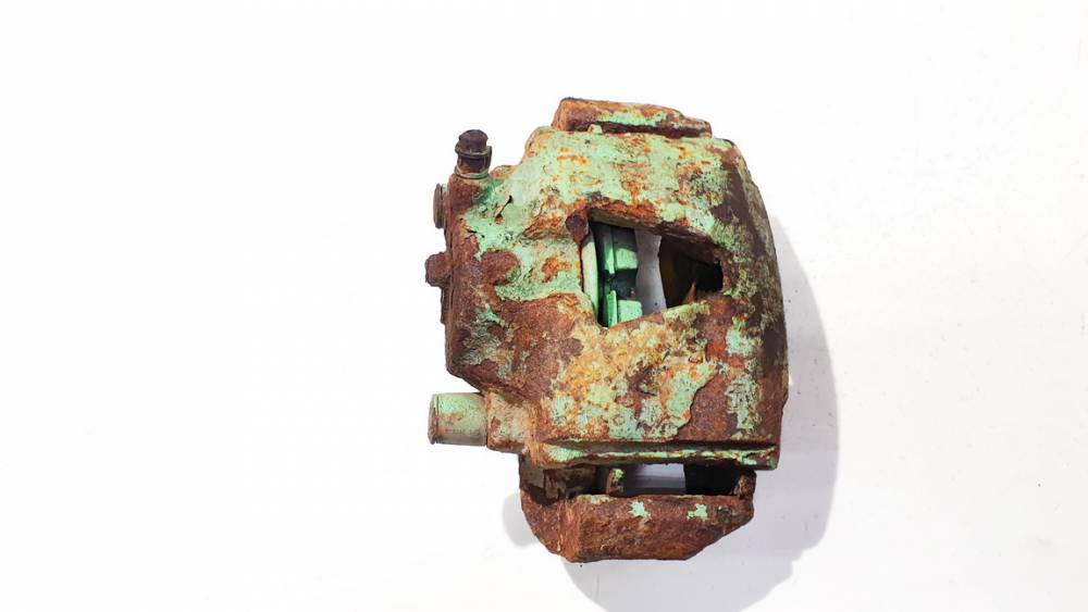 Opel Vectra 1997 Суппорт передний левый (Тормозной суппорт)