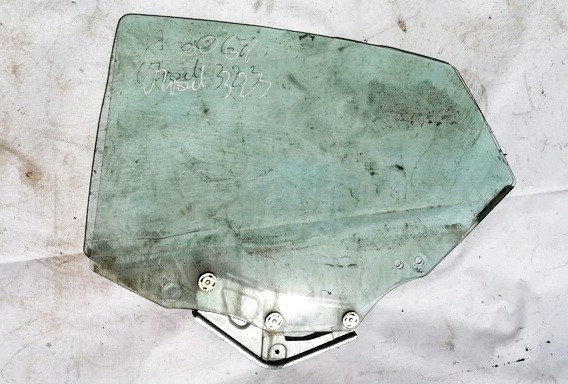 Mazda 323F 1998 Duru stiklas G.K.