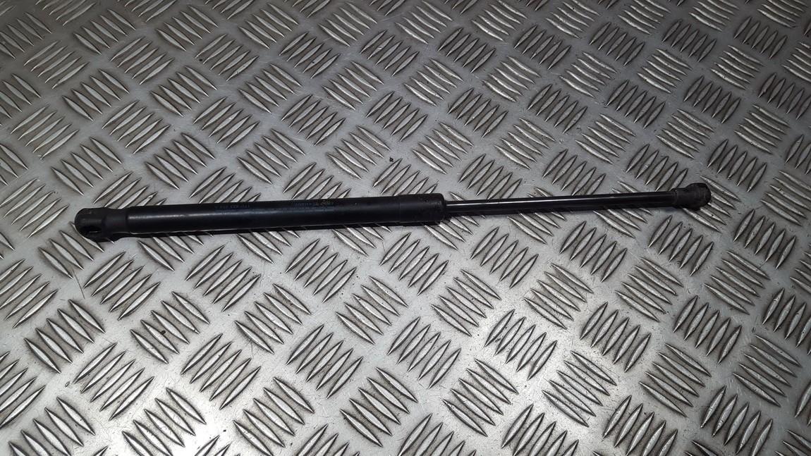 1T0823359A Volkswagen Caddy 2010 Amortyzator maski prawy - PRZEDNIE