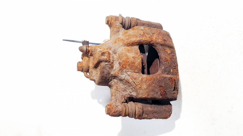 Toyota Aygo 2006 Zacisk hamulcowy - PRZEDNIE LEWE