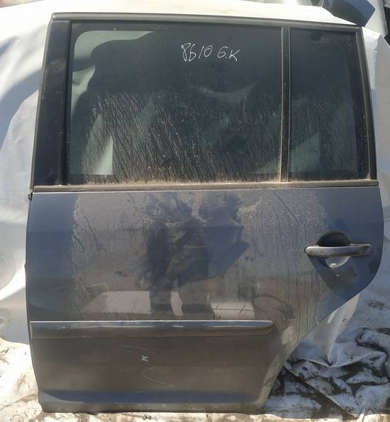 PILKOS Volkswagen Touran 2004 Durys G.K.