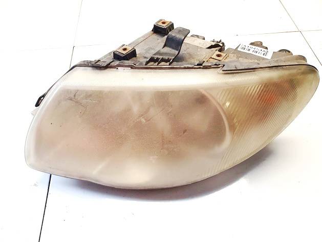 04857831AC Chrysler Voyager 2006 Headlight - FRONT LEFT