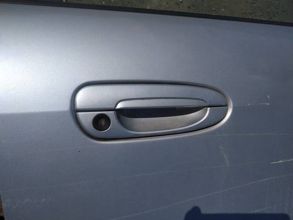Mazda 626 1998 Zewnętrzna klamka drzwi - PRZEDNIE PRAWE
