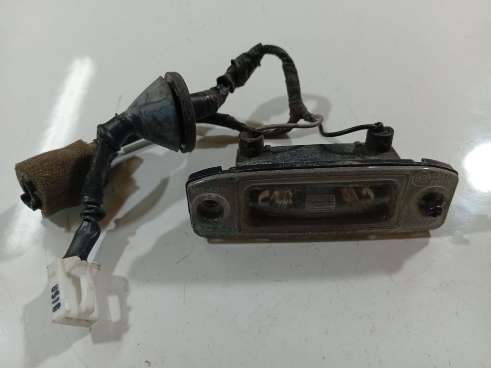 Kia Carens 2007 Numura apgaismojums - AIZMUGURE