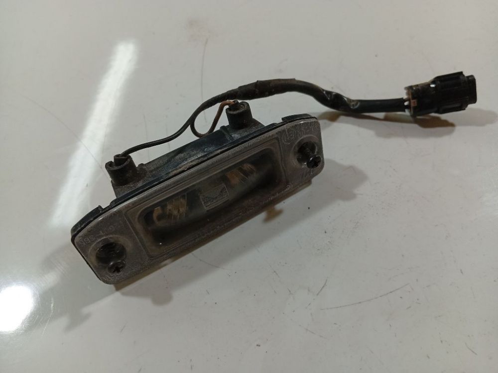 Kia Carens 2007 Numura apgaismojums - AIZMUGURE