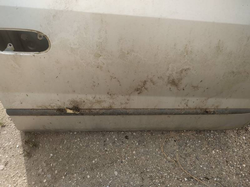 Nissan Almera Tino 2002 avant droite garniture porte de moulage