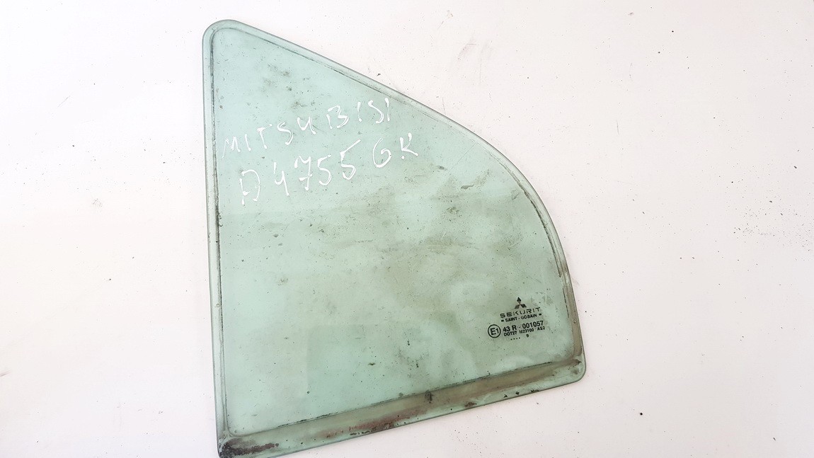 43R001057 Mitsubishi Carisma 2000 Quarter glass - REAR LEFT