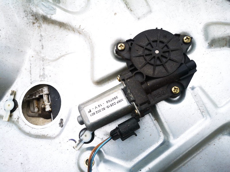 25070212V Fiat Stilo 2002 Silnik podnośnika szyby drzwi - PRZEDNIE LEWE