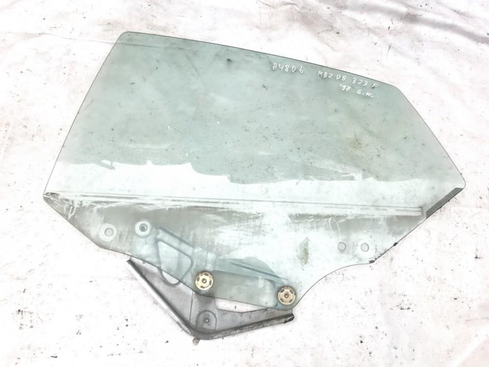 Mazda 323F 1997 Durvju stikls - AIZMUGURE PA KREISI