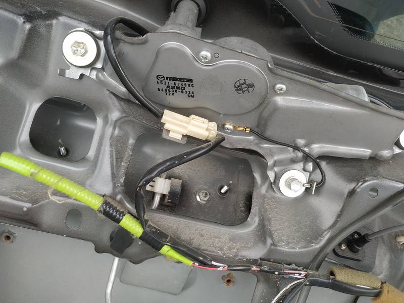 E62167450C Mazda CX-7 2010 Aizmugurējā loga slotiņas motors - AIZMUGURE