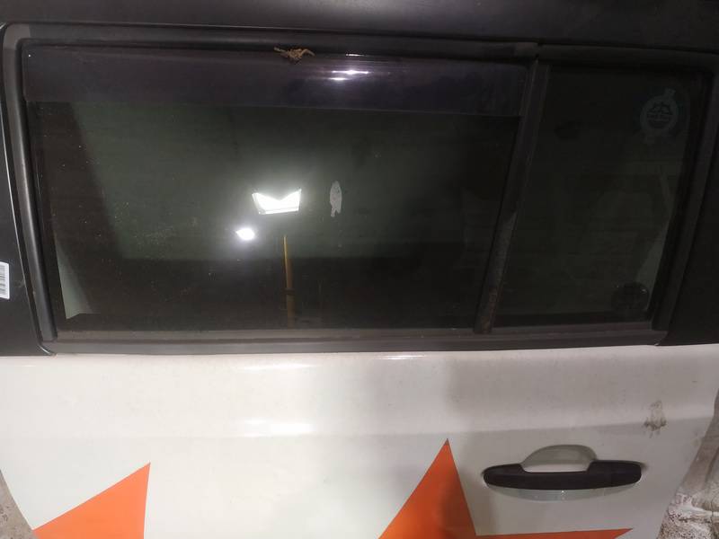 Daihatsu Materia 2010 Listón embellecedor de la ventana de la puerta trasera - TRASERO IZQUIERDO